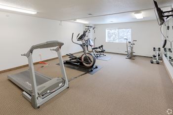 the gym at the whispering winds apartments in pearland, tx at Paraiso Estates, Minnesota